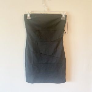 Worn ONCE, black tube dress with mesh inserts.